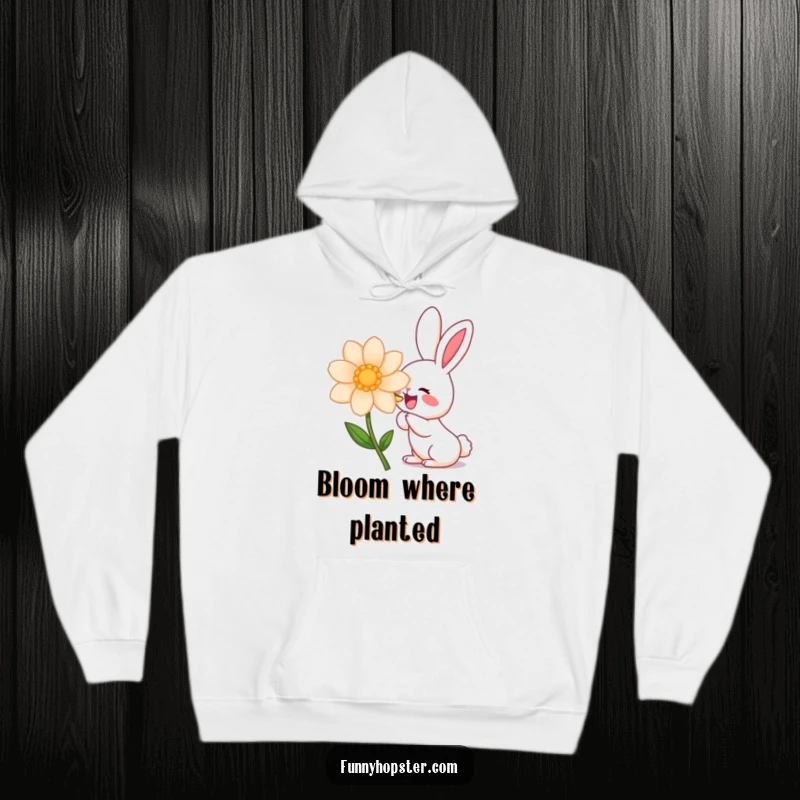 Funny kawaii rabbit character with eyes closed in pleasure sniffing a large, colorful flower, ideal for a funny hoodie.