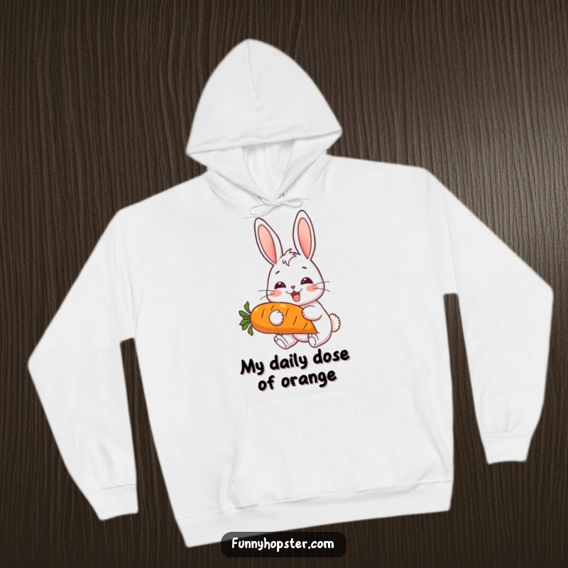 Funny hoodie depicting a joyful rabbit with perked ears, enthusiastically devouring a massive carrot, radiating warmth and humor.