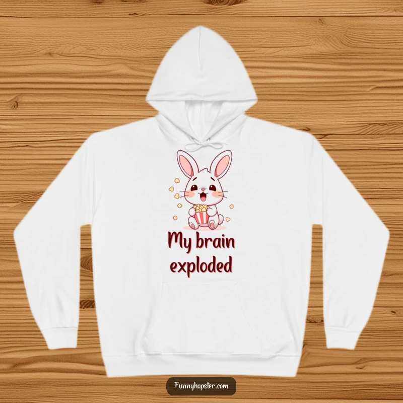Funny bunny with a shocked expression surrounded by flying popcorn, perfect for a cozy funny hoodie.