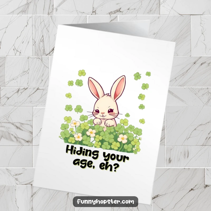 Funny Free Printable Birthday Card: A mischievous rabbit peeking from clover, planning a birthday prank.