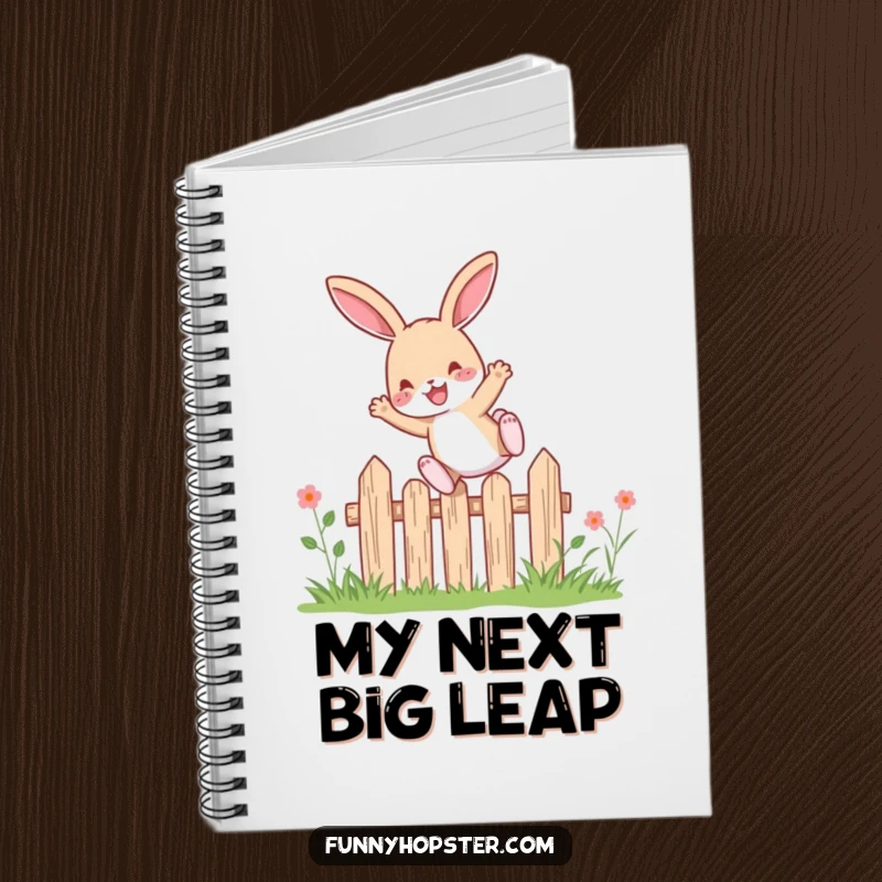Funny rabbit character leaping with pure delight over a small garden fence, illustrated on the cover of a notebook.