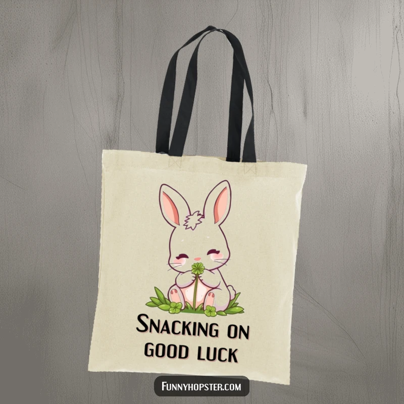 Funny Rabbit Tote Bag: A tote bag featuring a rabbit enjoying a clover, symbolizing luck and nature-themed charm for everyday use.